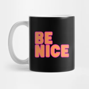 Be nice!  PInk and orange on black background Mug